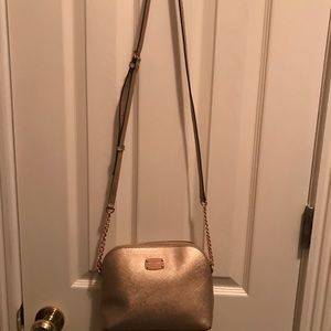 Michael Kors rose gold cross body bag